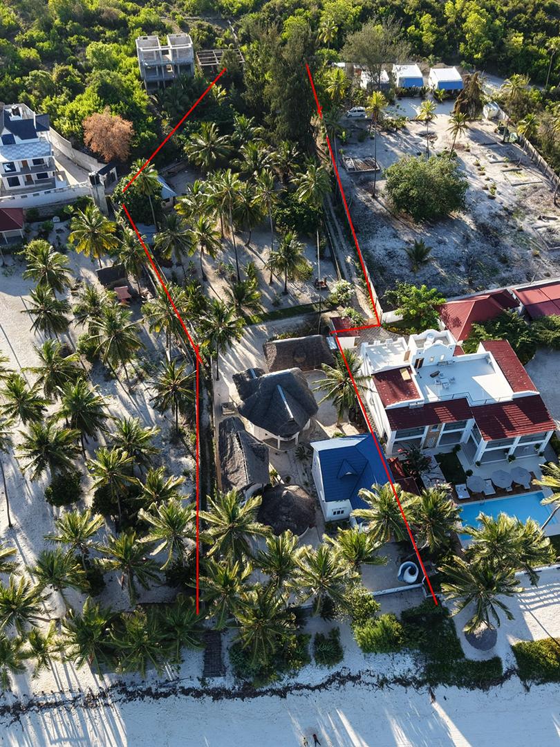 Prime Bwejuu Plot with Charming Bungalows – 3,153 sqm